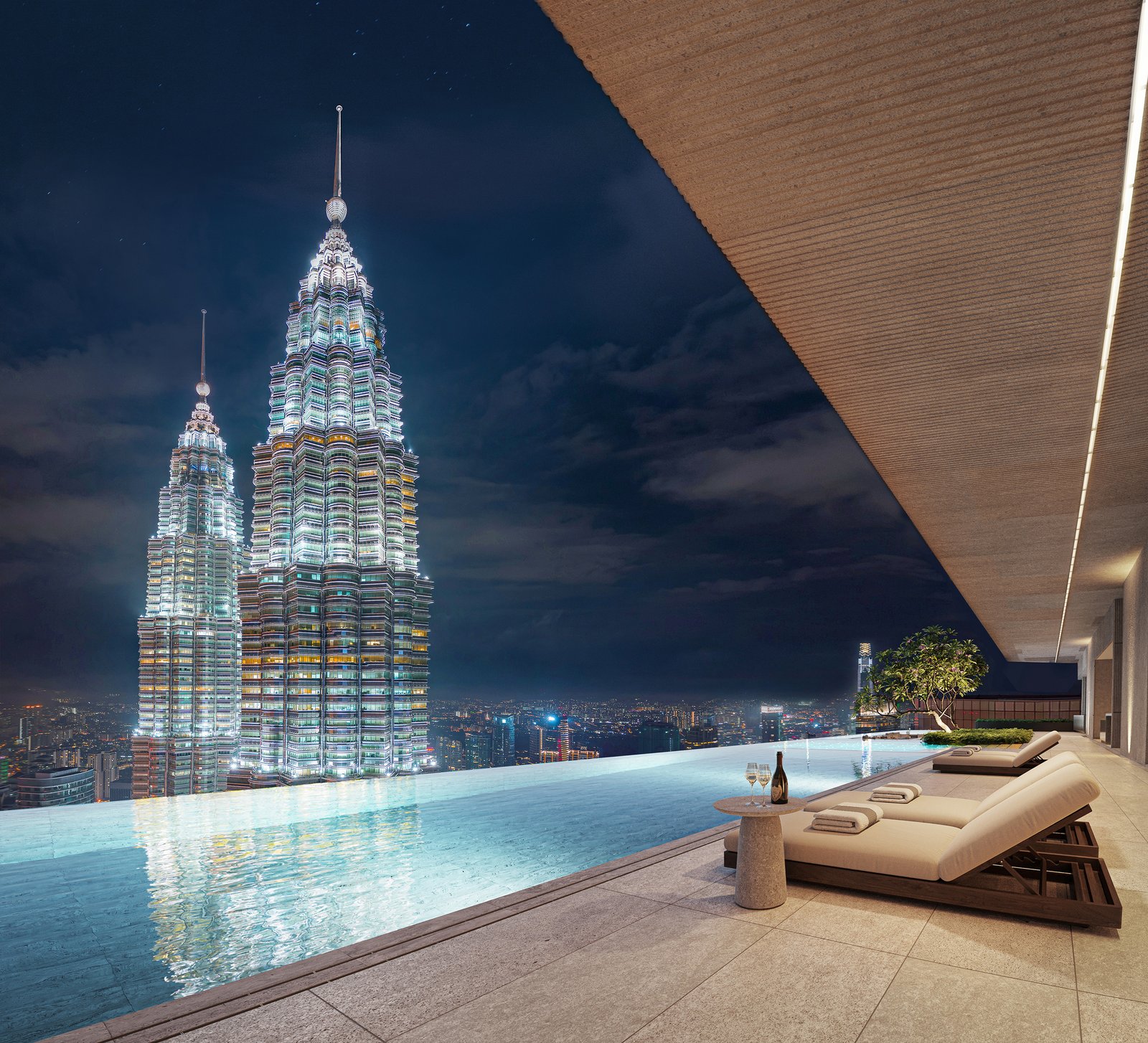 CloutHaus sky pool beside Petronas Twin Towers at night